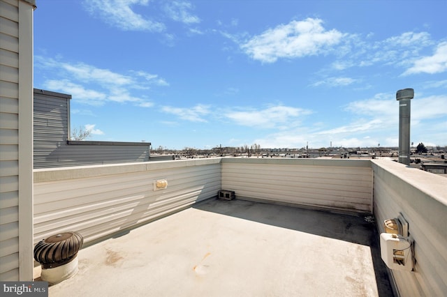 view of patio with a balcony