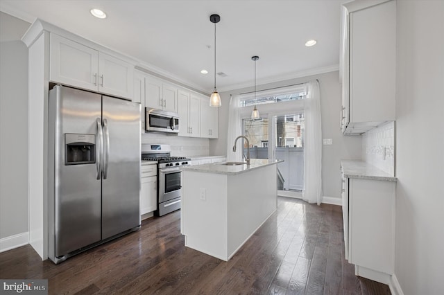 kitchen with white cabinetry, crown molding, stainless steel appliances, dark wood finished floors, and a sink