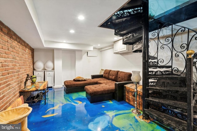 living area featuring recessed lighting and brick wall