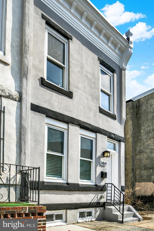 exterior space with stucco siding