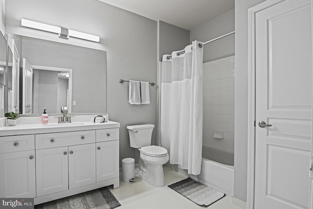 bathroom featuring vanity, tile patterned floors, toilet, and shower / bath combo