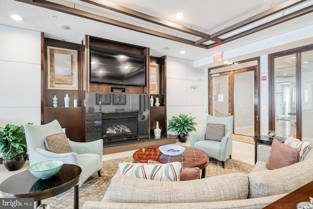 tiled living room featuring recessed lighting and a fireplace