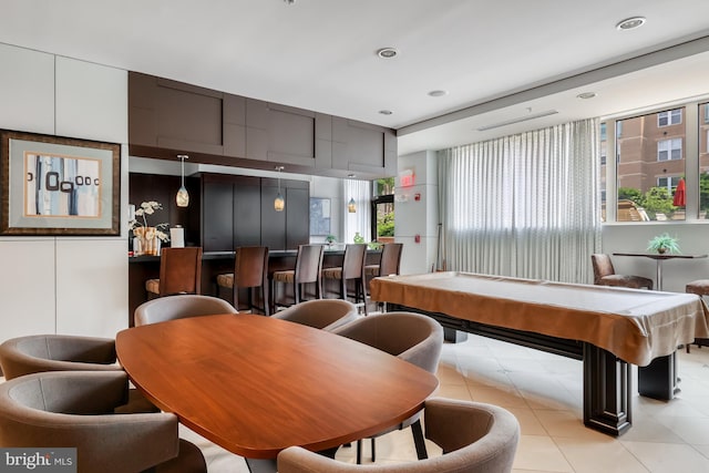 recreation room with light tile patterned flooring, plenty of natural light, and billiards