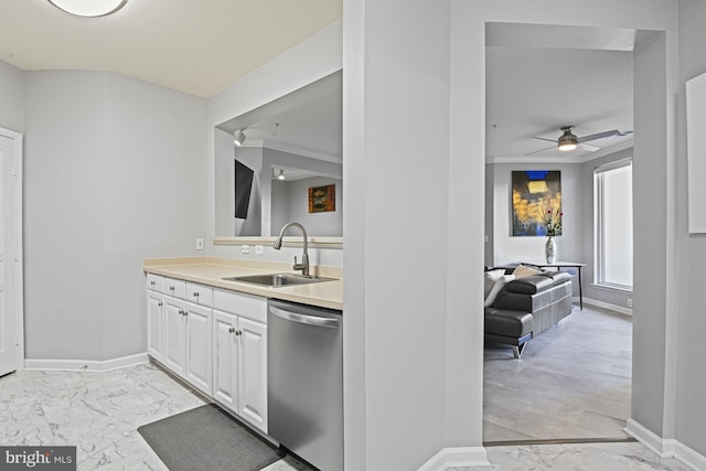 kitchen featuring a sink, baseboards, marble finish floor, and dishwasher