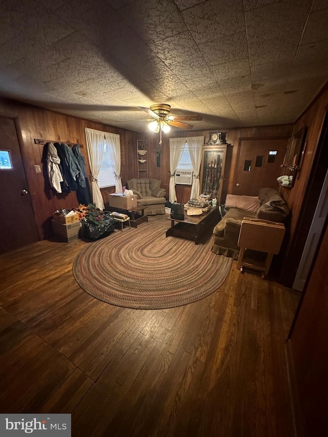 unfurnished room featuring a ceiling fan and hardwood / wood-style flooring