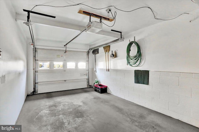 garage featuring a garage door opener