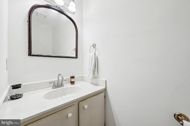 bathroom with visible vents and vanity