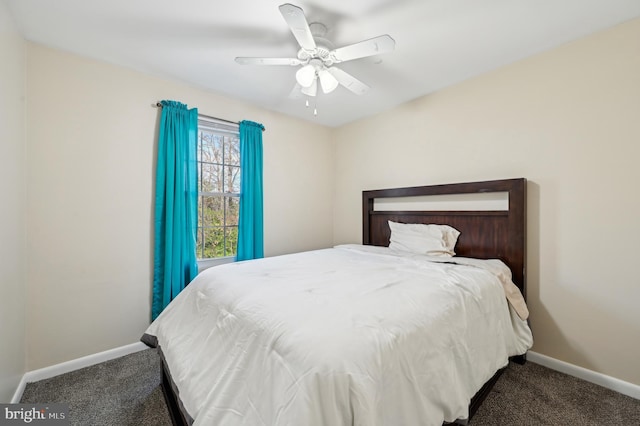 bedroom with baseboards, carpet floors, and ceiling fan