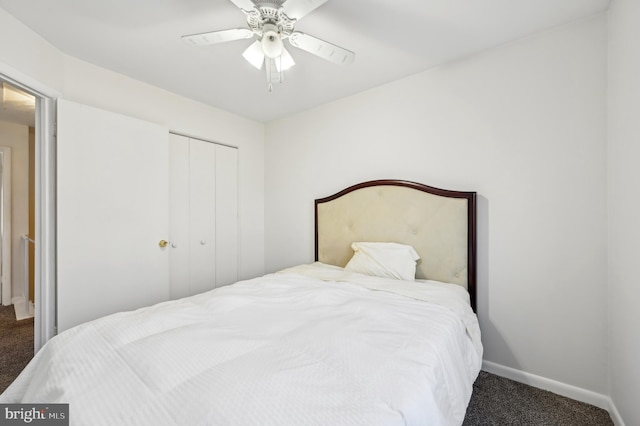 carpeted bedroom featuring a closet, ceiling fan, and baseboards
