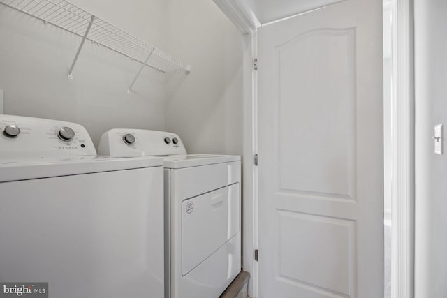 laundry room with washer and dryer