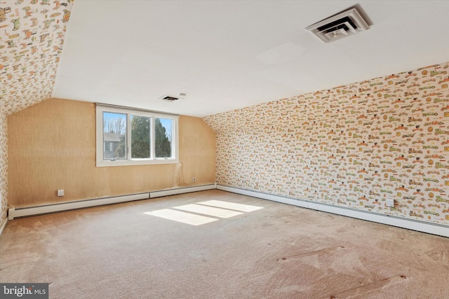 bonus room featuring visible vents, lofted ceiling, baseboard heating, and carpet flooring