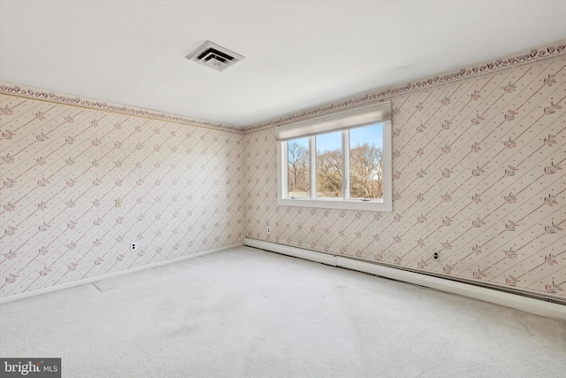 carpeted spare room with visible vents, wallpapered walls, baseboards, and a baseboard radiator