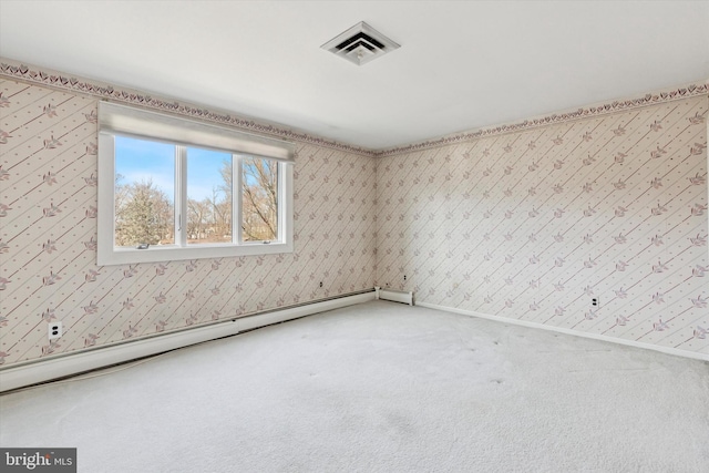 spare room with visible vents, wallpapered walls, a baseboard heating unit, baseboards, and carpet flooring