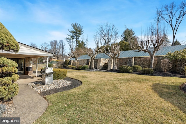 view of yard featuring fence