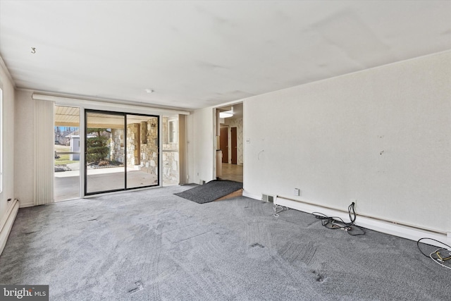 empty room featuring visible vents and carpet floors