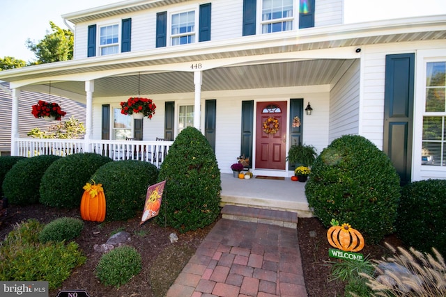 entrance to property with a porch