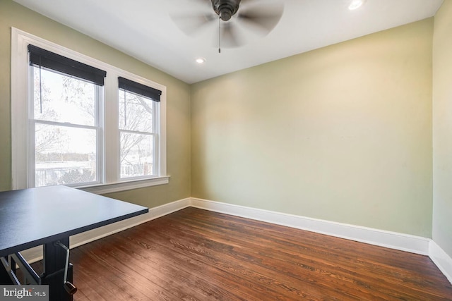 unfurnished office with recessed lighting, baseboards, dark wood-style flooring, and ceiling fan