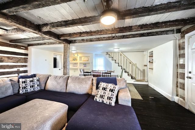 living room featuring stairs, wood ceiling, dark wood finished floors, and beamed ceiling