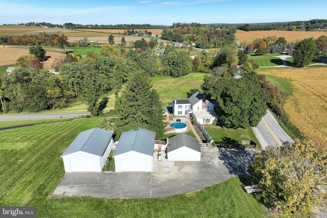 birds eye view of property featuring a rural view