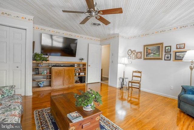 living room with baseboards, visible vents, ceiling fan, wood ceiling, and light wood-style floors