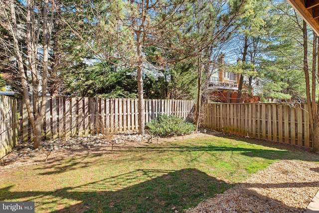 view of yard featuring a fenced backyard