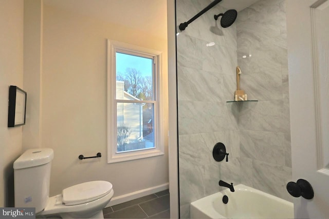 full bathroom with tile patterned flooring, toilet, tub / shower combination, and baseboards