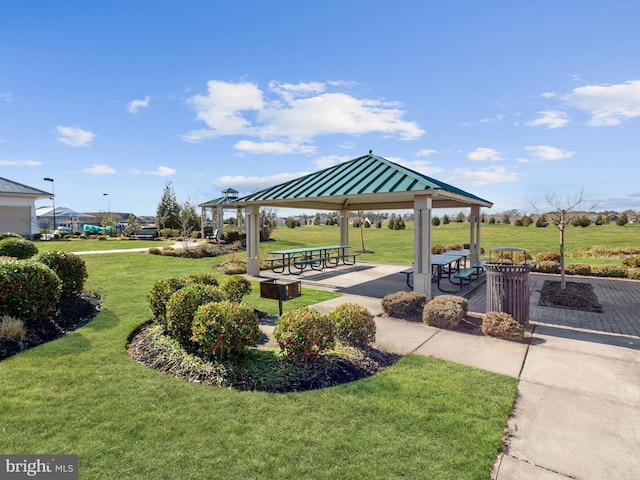 view of community featuring a gazebo and a yard