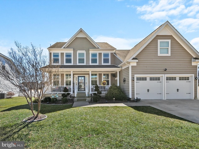 view of front of home with driveway, covered porch, a front yard, and a shingled roof