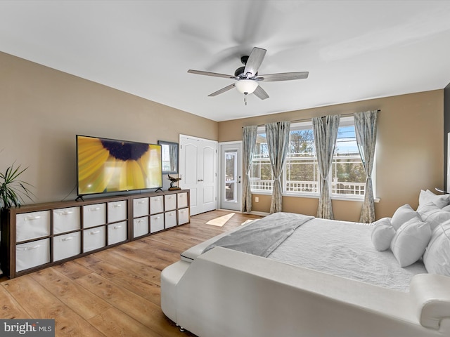 bedroom with ceiling fan and wood finished floors