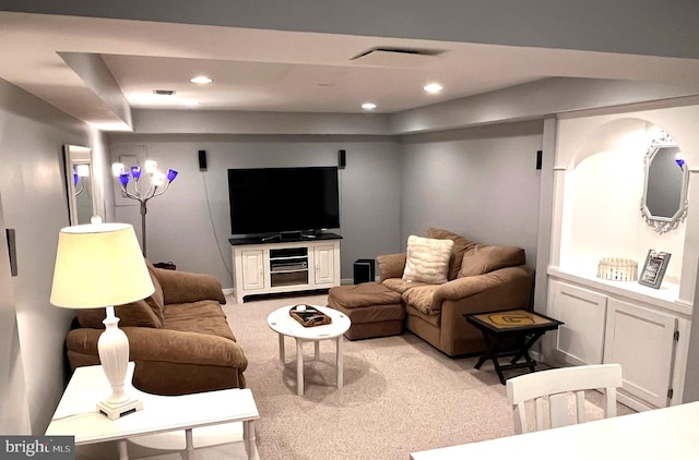 living area with recessed lighting and carpet