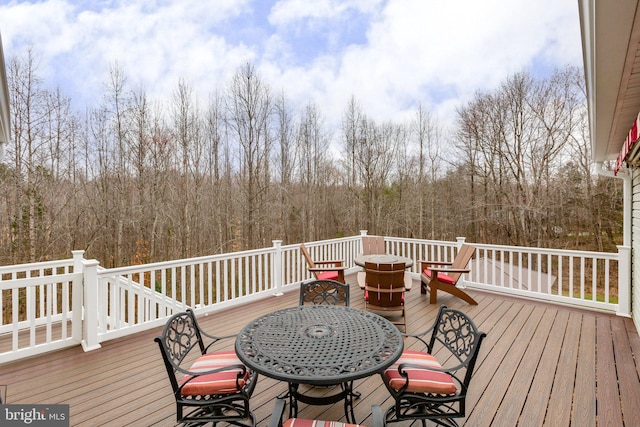 deck featuring outdoor dining space