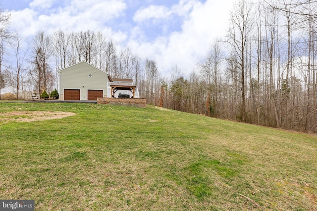 view of yard featuring a garage