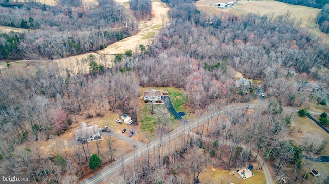 bird's eye view featuring a view of trees