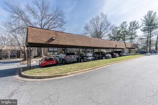 view of partially covered parking lot