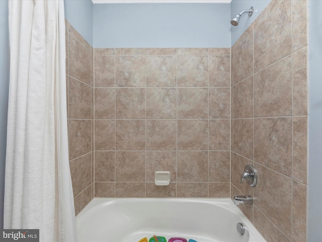 full bathroom with shower / bath combo