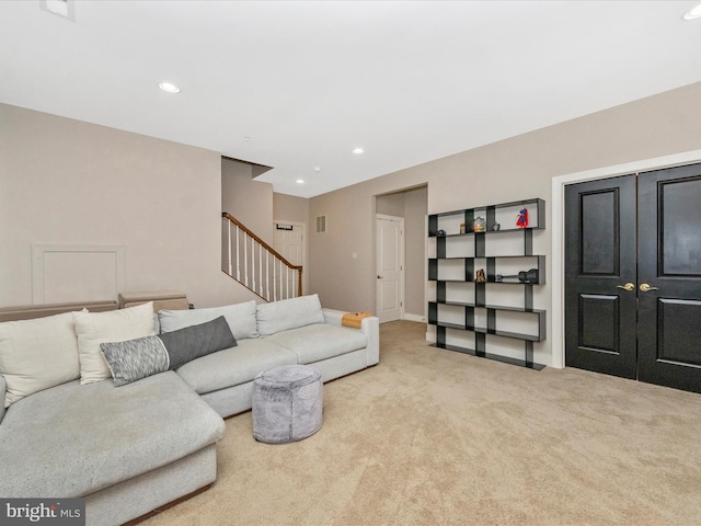 carpeted living room featuring visible vents, stairway, recessed lighting, and baseboards