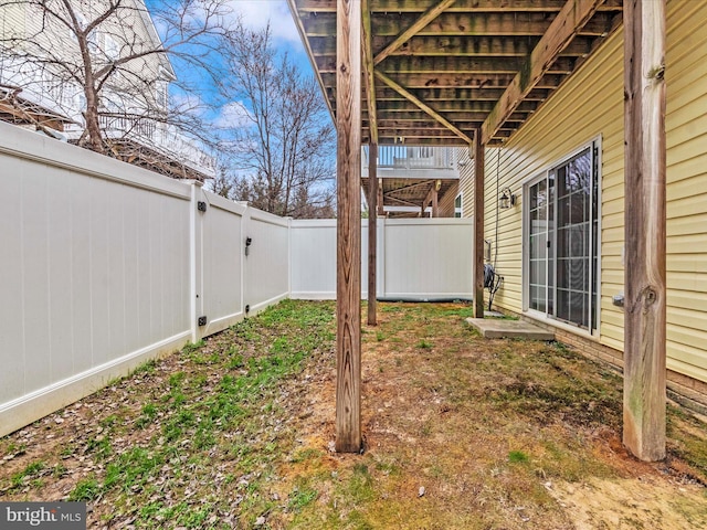 view of yard with a fenced backyard