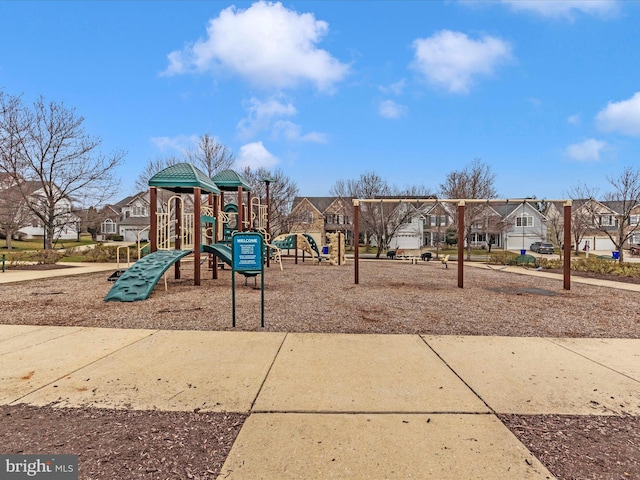 community playground featuring a residential view