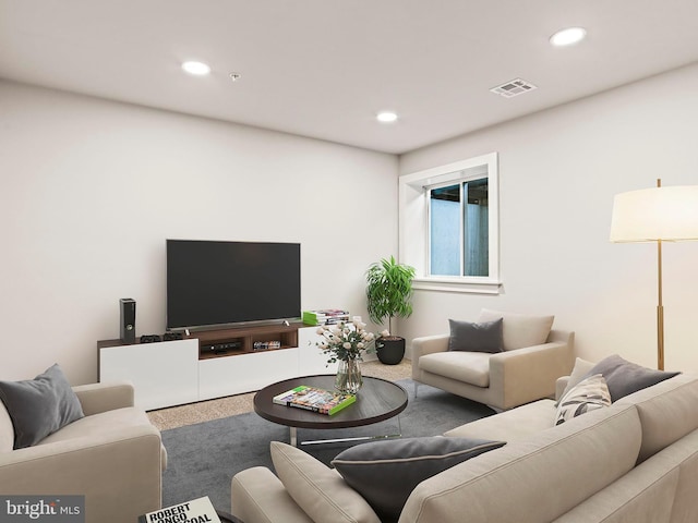 living area featuring recessed lighting, visible vents, and carpet floors