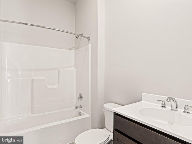 full bathroom featuring shower / bath combination, toilet, and vanity