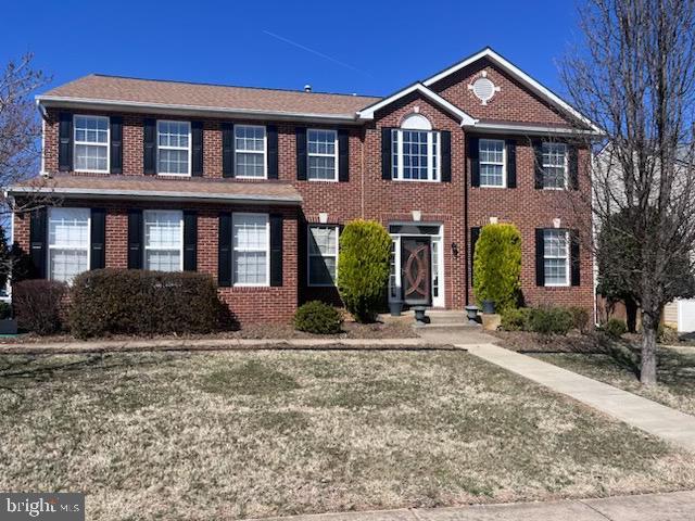 colonial house with brick siding