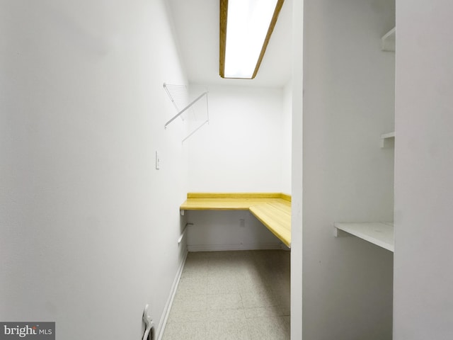 walk in closet featuring tile patterned floors