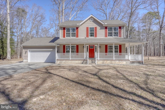 view of front of property with a porch, a garage, roof with shingles, and aphalt driveway