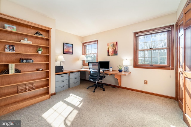 office area with carpet and baseboards