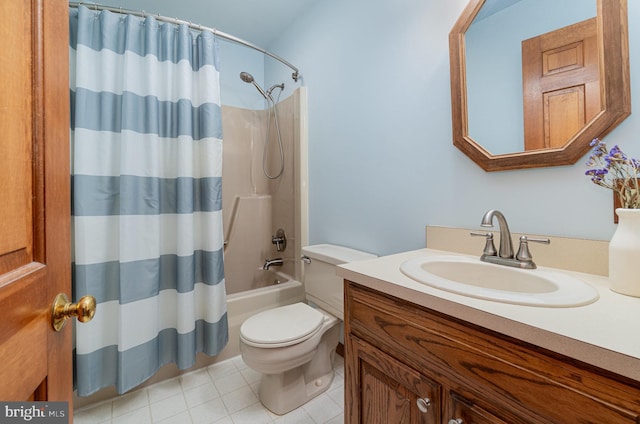 bathroom with tile patterned floors, shower / tub combo with curtain, toilet, and vanity