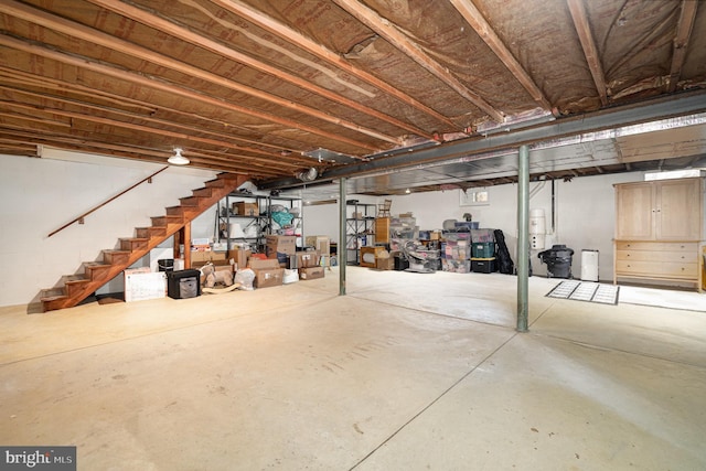 unfinished basement with stairway