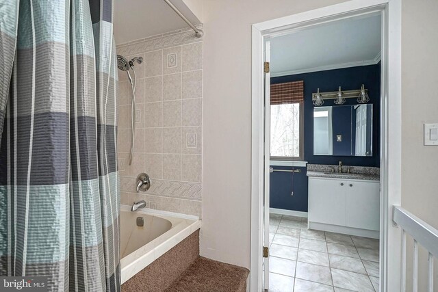 bathroom with tile patterned flooring, crown molding, vanity, and shower / tub combo