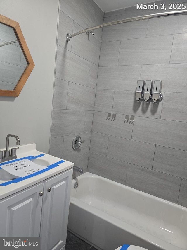 full bath with vanity and shower / bathing tub combination