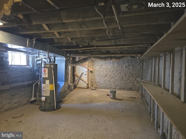 basement featuring water heater