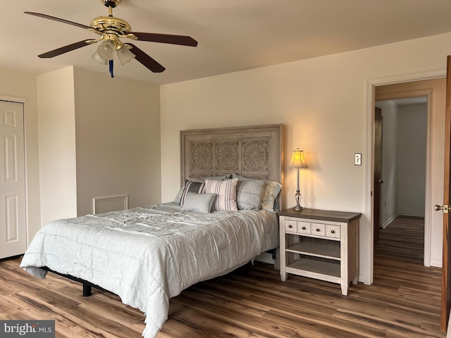 bedroom featuring wood finished floors and a ceiling fan